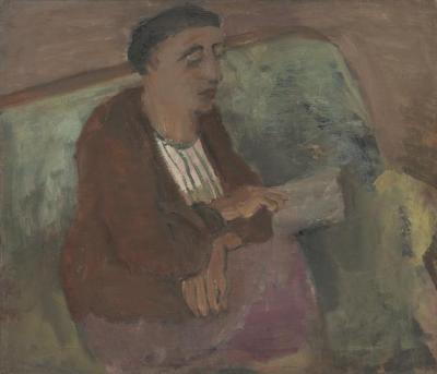 [Woman on green sofa reading]