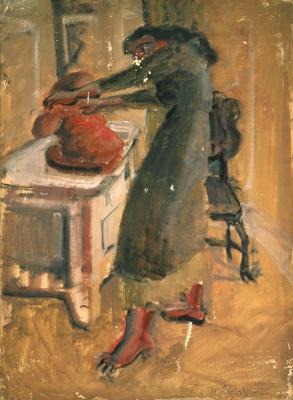 [Woman seated at table]