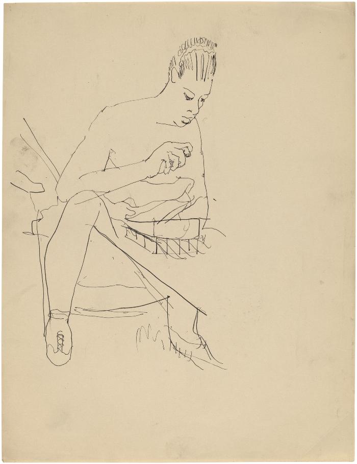 [Woman seated at table]