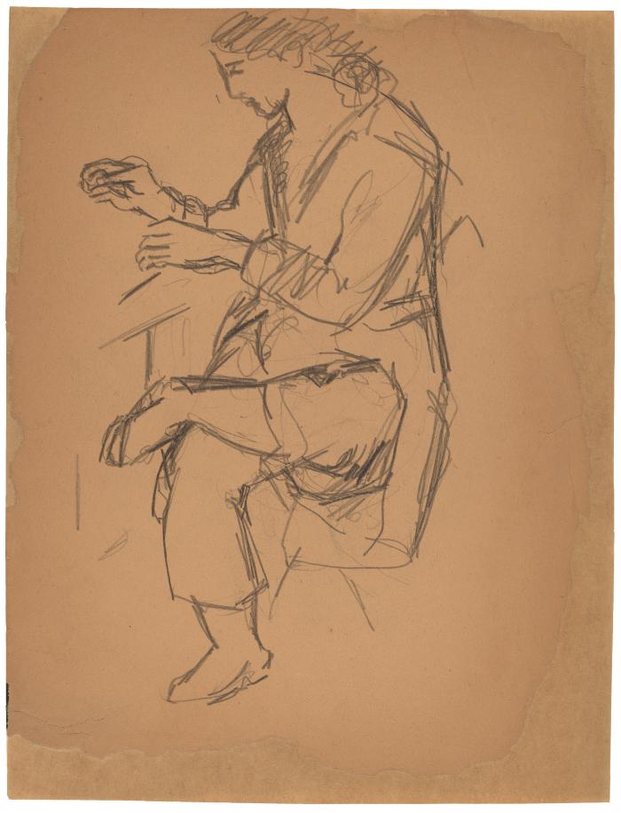 [Woman seated at table]