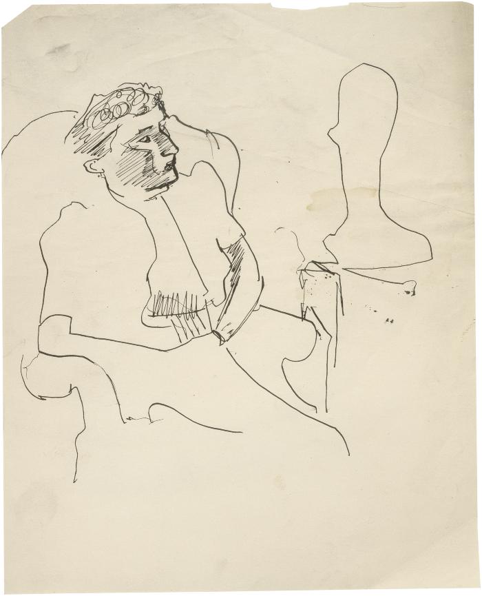 [Woman in armchair with sculpture]