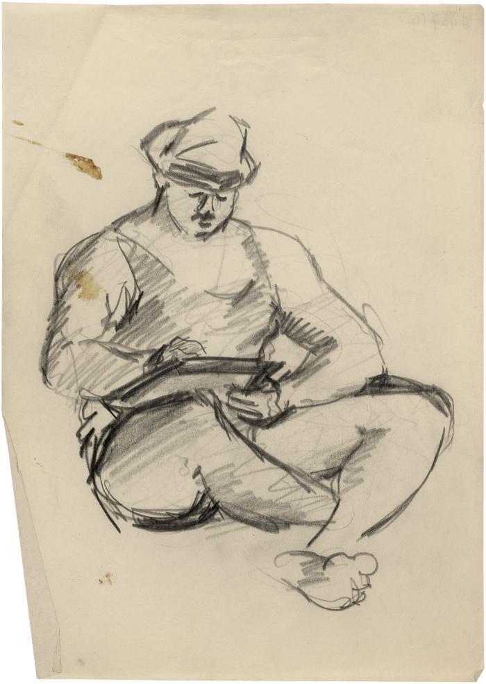 [Seated man with book]